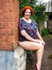 Gilf Pic - Glamour Shot of a 70-Year-Old Woman in a Retro Swimsuit